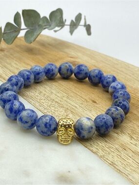 Blue Sodalite Beaded Bracelet with Gold Skull Accent